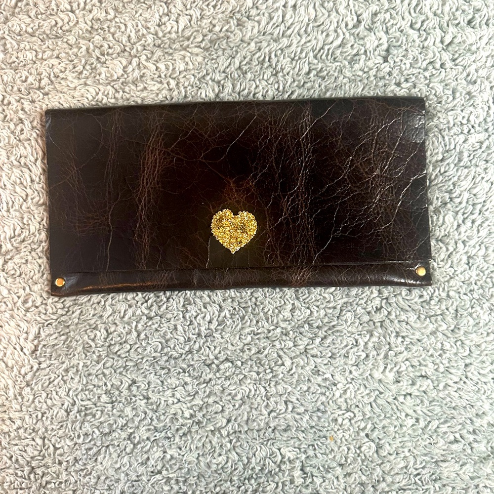 Moss Mills leather clutch.